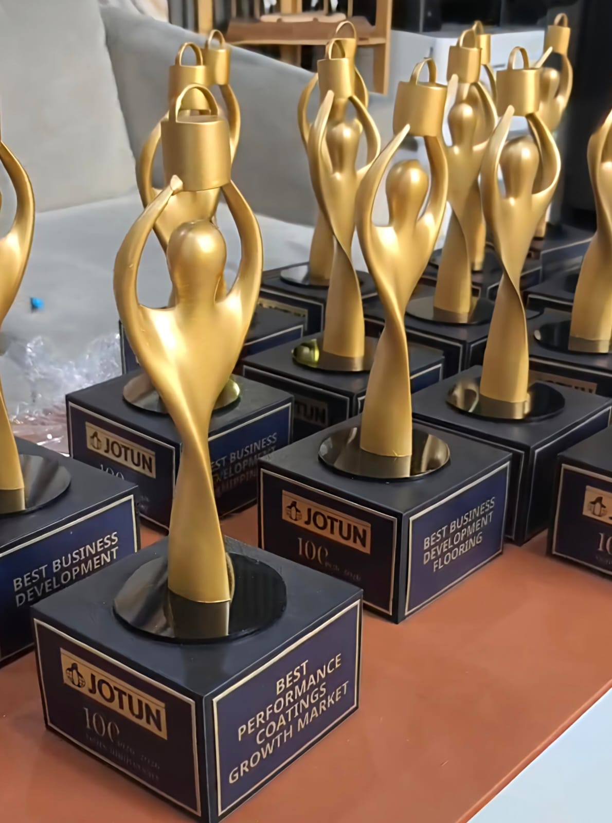 3D printed gold Jotun award trophies for corporate event